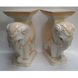 A pair of Italian china elephant form conservatory seats/plant stands