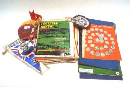 A box of football memorabilia, including 'Football Weeklies',