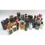 Two boxed bottles of Dunhill eau de toilette and other perfumes