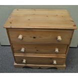 A pine chest of drawers