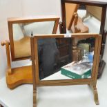 Three mahogany swing frame mirrors