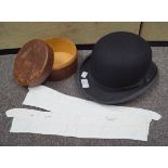 A black bowler hat, a Christy's of London trilby hat,