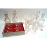 A quantity of cut glass decanters and stoppers and other glass