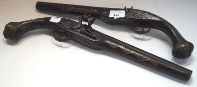 A pair of ornamental pistols