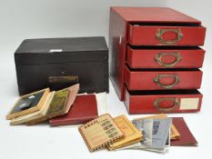 A box of photos and ephemera and a four drawer cabinet
