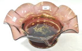 A large amethyst glass bowl