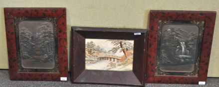 A Japanese silkwork picture in lacquered frame and a pair of Japanese lacquered picture frames