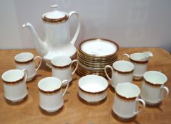 A Royal Albert coffee set in the 'Holyrood' pattern, to include seen cups and saucers, six plates,