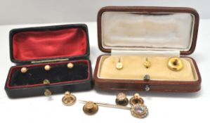 Three cased 9ct yellow gold shirt studs and others with a tie pin