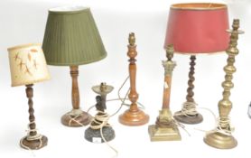 A selection of brass and wood lamps