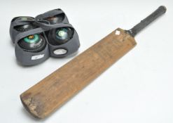 Four Henselite bowls and a vintage cricket bat