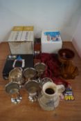 A group of silver plated cups and other items