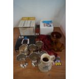 A group of silver plated cups and other items