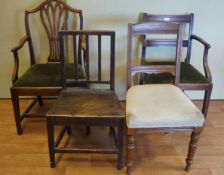 A collection of four chairs