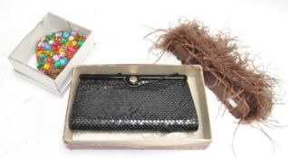A jewelled evening bag and two others