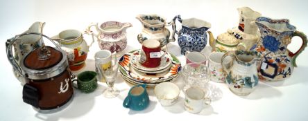 A selection of assorted glassware and ceramics to include a Masons jug
