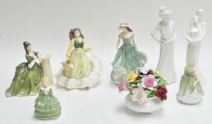 Seven Royal Doulton figures and a Royal Doulton flower vase