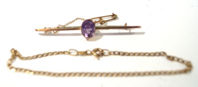 A 9ct yellow gold bracelet and a yellow metal bar brooch