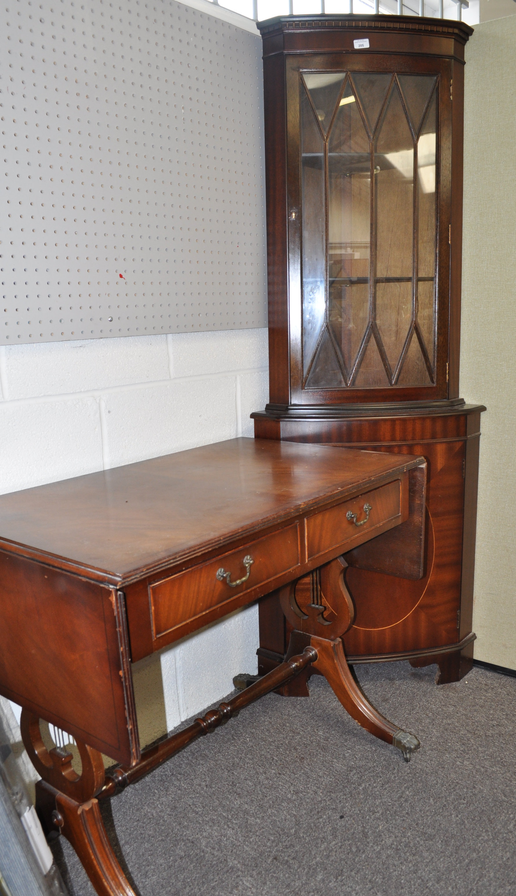 A sofa table and a corner cabinet