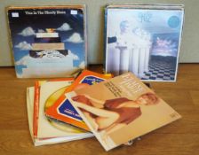 A group of assorted records