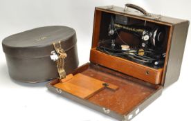 A sewing machine and a hat box