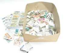 A box of cigarette cards etc