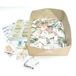 A box of cigarette cards etc