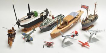 A collection of model boats and others