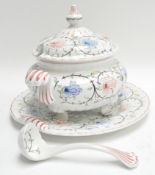 A faience soup tureen, cover,