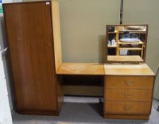 A teak combination chest of drawers/dressing table/wardrobe