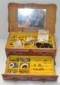 A selection of assorted costume jewellery in a jewellery box,