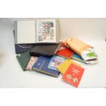 A quantity of stamp and coin albums with FDCs ephemera and pre-decimal stamp collection