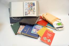 A quantity of stamp and coin albums with FDCs ephemera and pre-decimal stamp collection