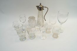 A selection of drinking glasses and a claret jug