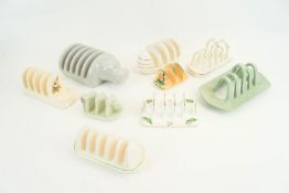 A group of assorted pottery toast racks