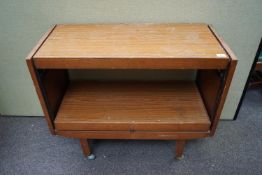 A side/dining table, in teak,