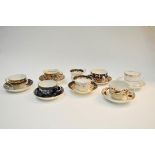 Seven 18th/19th century cups and saucers, being gilt and painted, to include Barr, Worcester,