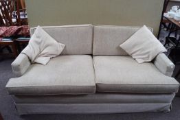 A two seat sofa,