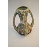 An Art Deco sessionist period vase, having four handles, with mottled design,
