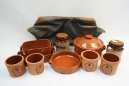 A group of assorted terracotta kitchen ware