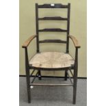 A rush seat ladder back chair