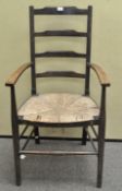 A rush seat ladder back chair