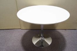 A round table on chrome base,