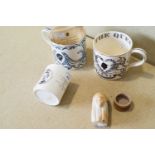 Two Wedgwood mugs, designed by Guyatt,