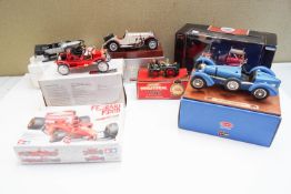 A group of collector's boxed model cars