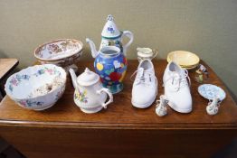 A selection of ceramics and a pair of bowls shoes