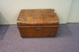 A 19th/20th century metal trunk with domed and stud top