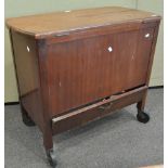 A hinged top mahogany cocktail cabinet/table,