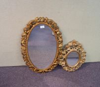 A gilt framed mirror and another