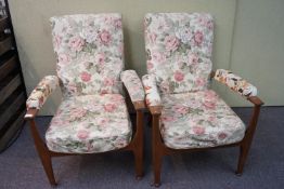 A pair of retro Parker Knoll armchairs,